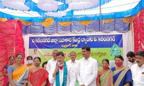 NAFSCOB Chairman K Ravinder Rao speaking at a programme after inaugurating DCCB’s 32nd ATM centre in Rudrangi