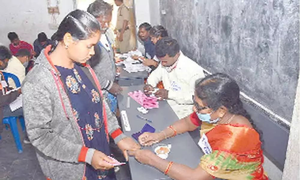 People casting votes at a polling station in Gangavaram in Chittoor district  on Wednesday