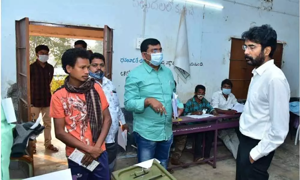 District Collector D Muralidhar Reddy inspecting the polling stations in Maredumilli mandal of East Godavari district on Wednesday