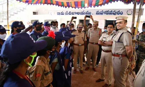 Guntur Range DIG CM Trivikrama Varma and SP Siddharth Kaushal inspecting security arrangements for polling at Singarayakonda