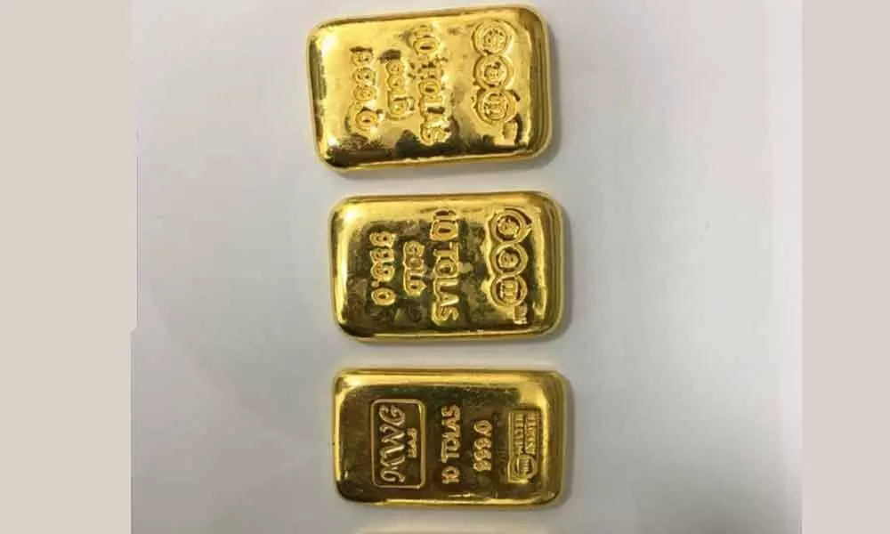 2 held with 1.4 kg gold at RGIA