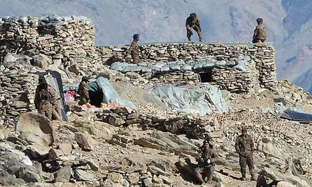 People Liberation Army (PLA) soldiers during military disengagement along the Line of Actual Control (LAC) at the India-China border in Ladakh. Credit: AFP File Photo