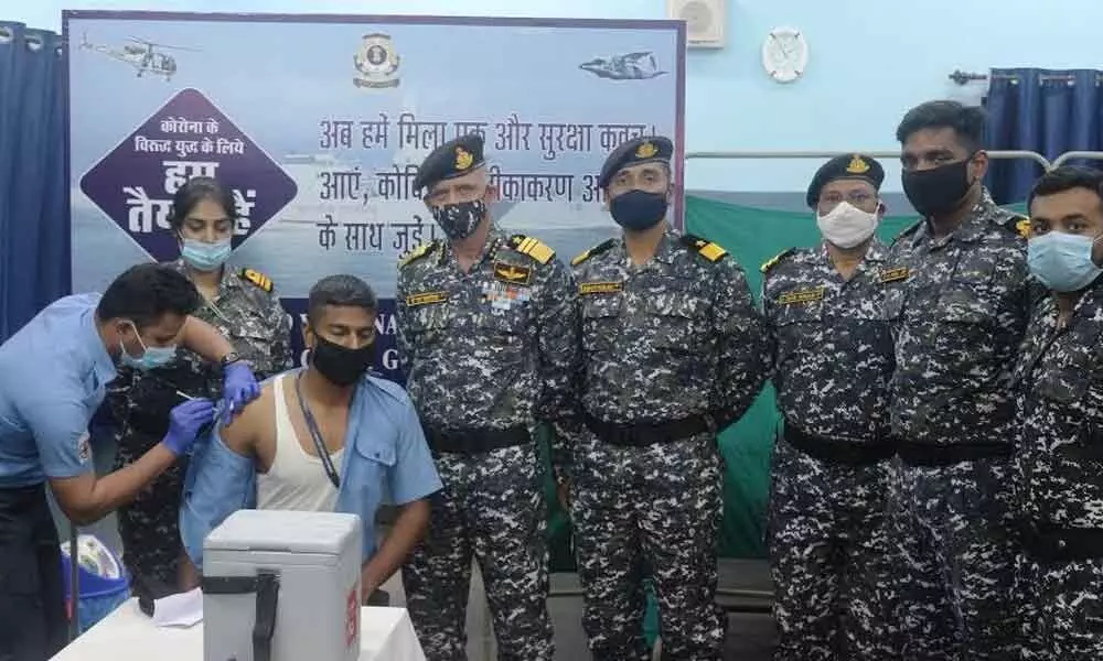 Coast Guard personnel get vaccinated as a part of the immunisation drive