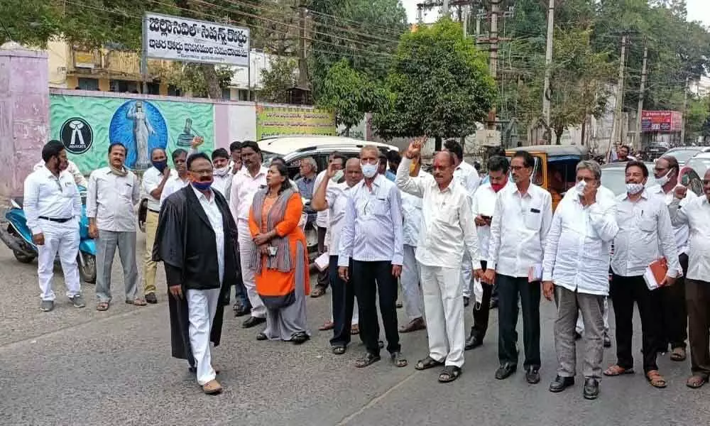 Ongole Bar Association members protesting against the murder of advocate couple in Telangana, in Ongole on Friday