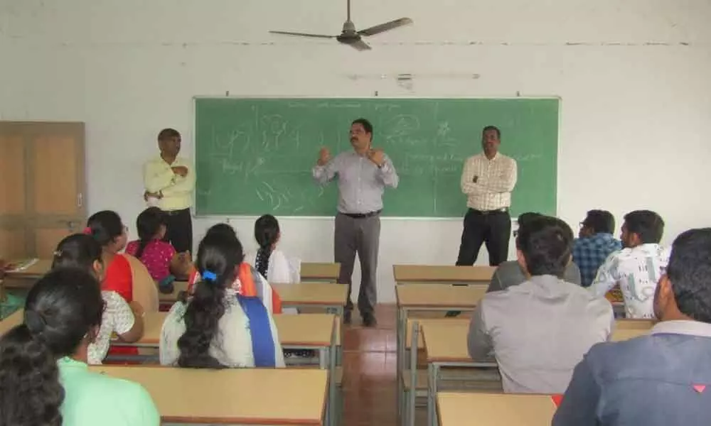Principal Ravi Kumar addressing the students in the induction programme at SACET in Chirala on Friday