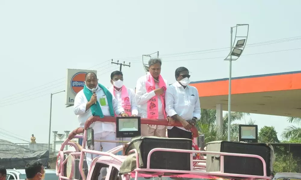 Transport Minister Puvvada Ajay Kumar, MP Nama Nageswara Rao and TRS MLC nominee Palla Rajeshwar Reddy participating in a road show in Kalluru on Saturday