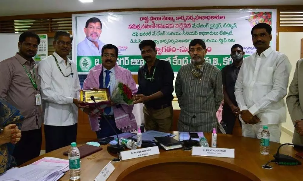 TSCAB Director Dr N Muralidhar being felicitated at a State-level review meeting at Karimnagar DCCB office on Saturday