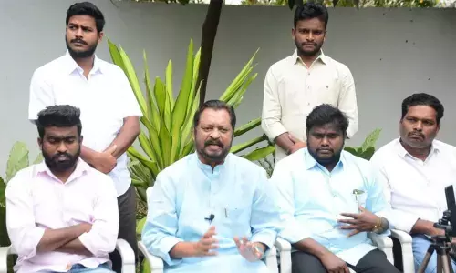 Congress former MP G V Harsha Kumar addressing the media at his residence in Rajamahendravaram on Saturday