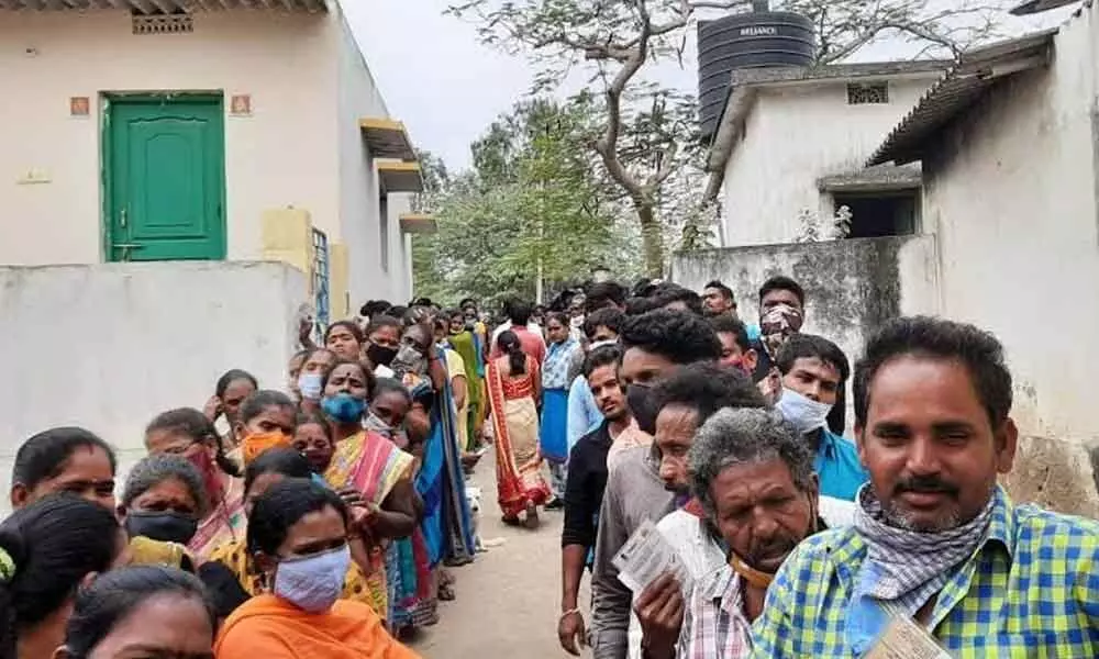Voters waiting for their turn to exercise their franchise in Visakhapatnam division on Sunday.