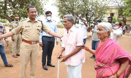 SP Bhaskar Bhushan helping the elderly people to exercise their franchise in BR Palem mandal on Sunday.