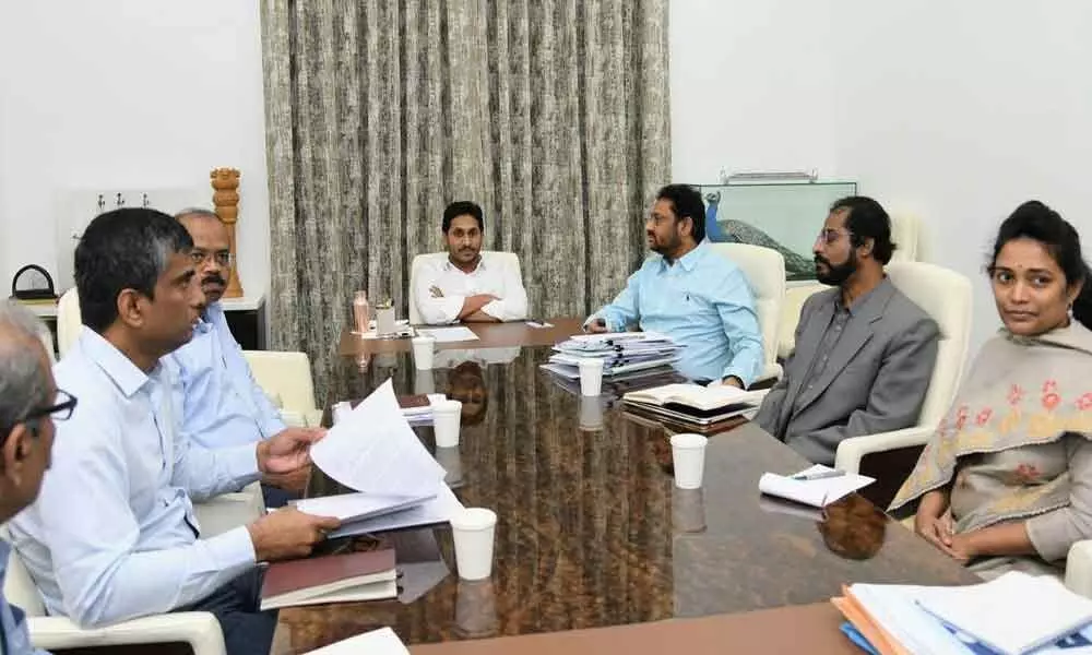 Chief Minister Y S Jagan Mohan Reddy holding a review with Planning Dept officials at his camp office on Monday