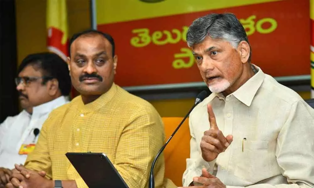 TDP national president and former Chief Minister N Chandrababu Naidu and party State president Kinjarapu Atchannaidu addressing a press conference at party office in Mangalagiri on Monday
