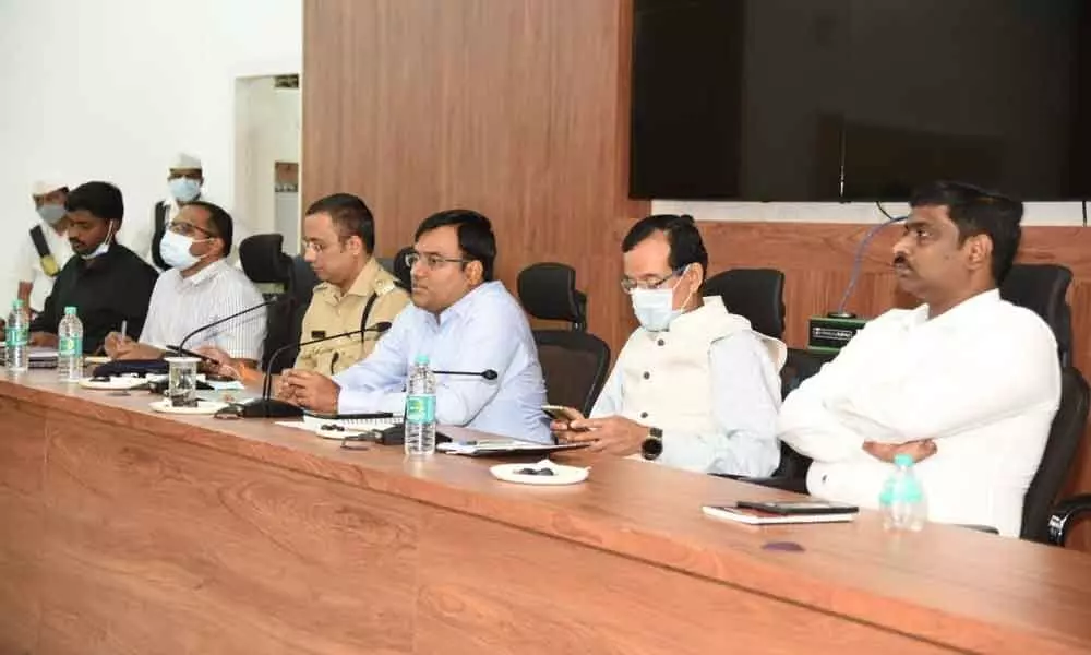 District Collector K V N Chakradhar Babu addressing the Municipal Commissioners and polling staff in Nellore on Monday. Election Observer  P Basant Kumar and SP Bhaskar Bhushan are also seen