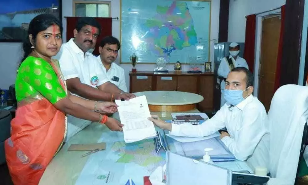 Yuva Telangana Party MLC candidate for Nalgonda-Khammam-Warangal Graduate Constituency G Rani Rudrama, along with party founder president Jitta Balakrishna Reddy, submitting her nomination to Returning Officer and District Collector Prashanth Jeevan Patil at his chamber in Nalgonda on Monday.