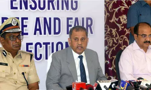 State Election Commissioner N Ramesh Kumar addressing the media on panchayat elections in Vijayawada on Monday. Addl DGP N Sanjeev and SEC Secretary  K Kannababu are seen.