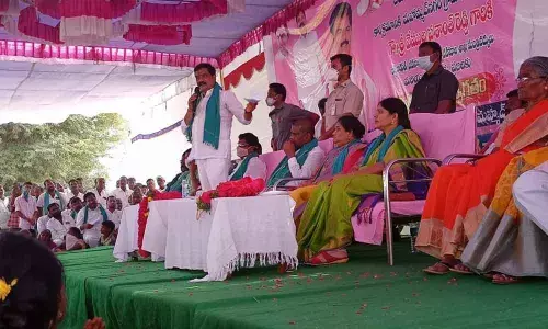 Roads and Building Minister Vemula Prashant Reddy addressing a gathering after inaugurating new Gram Panchayat building in Mohammad Nagar village in Nizamsagar mandal in Kamareddy district on Monday