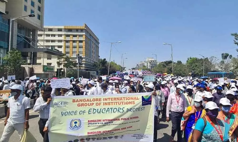 Private school staff protest against fee reduction