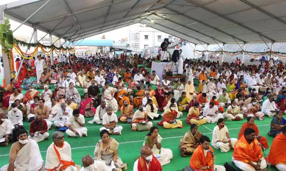 Devotees taking part in Vishnu Sahasranama Parayanam at Tirumala on Tuesday