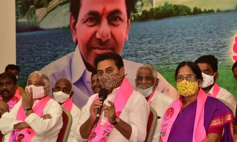 TRS working president K Tarakarama Rao addressing a meeting at Telangana Bhavan on Wednesday