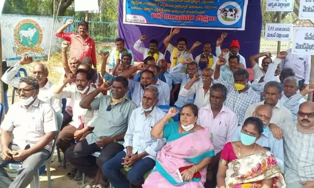 Ongole Dairy workers and employees on relay hunger strike in front of Ongole Dairy on Wednesday