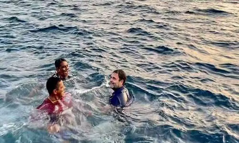 Congress leader Rahul Gandhi on Wednesday took a dip in the Arabian Sea with fishermen during his visit to Keralas Kollam district to campaign for the upcoming assembly elections.