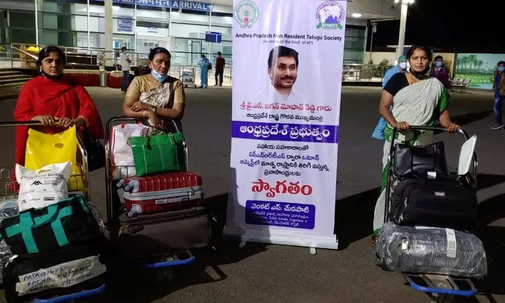 Telugu people from Oman arriving at Gannavaram Airport on Thursday