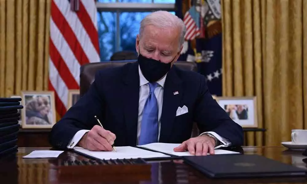 Biden revokes Trump’s immigrant visa ban