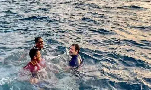 Congress leader Rahul Gandhi on Wednesday took a dip in the Arabian Sea with fishermen during his visit to Keralas Kollam district to campaign for the upcoming assembly elections.