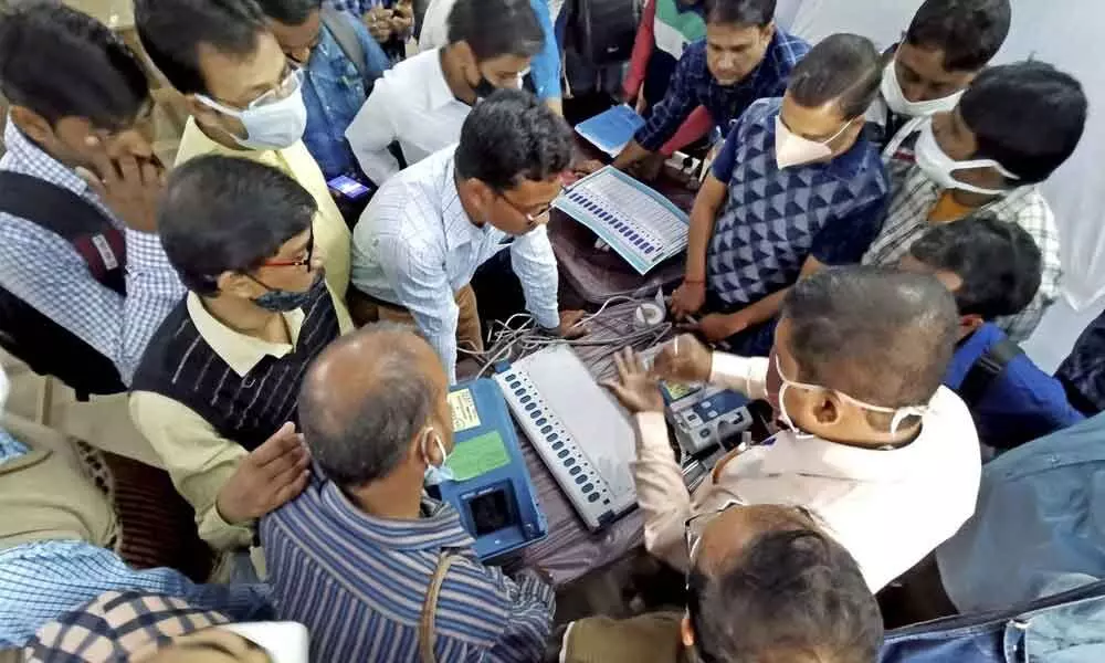Experts demonstrate the working of EVM and VVPAT during a training programme ahead of the West Bengal Assembly elections 2021, at Suri in Birbhum district of West Bengal