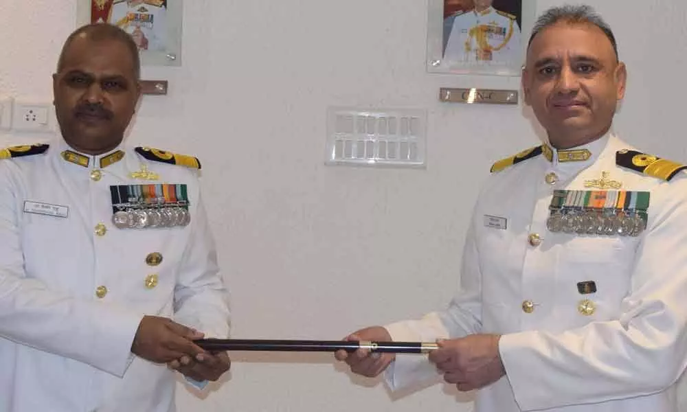 Cmde MG Raju (left) takes over as the Naval Officer in Charge of Andhra Pradesh from Commodore Sanjiv Issar