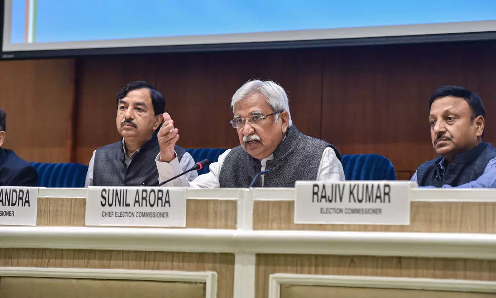 Chief Election Commissioner Sunil Arora (C) with Election Commissioners Sushil Chandra (L) and Rajiv Kumar addresses a press conference in New Delhi on Friday