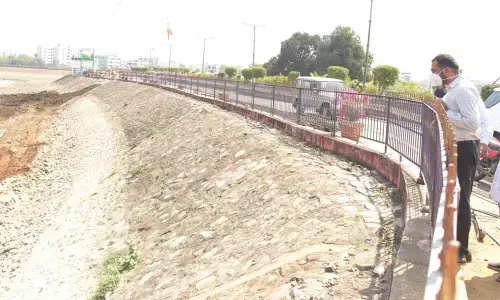 District Collector RV Karnan inspecting Lakaram tank bund works in Khammam on Friday