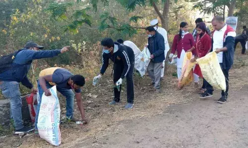 ITDA Project Officer Praveen Aditya participating in Sramadanam in Rampachodavaram on Friday