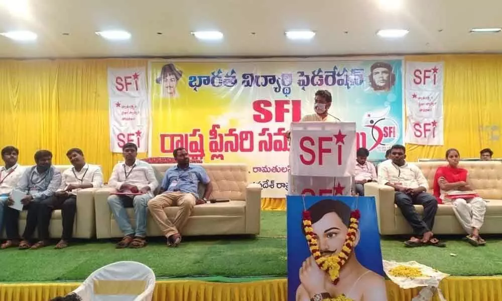 SFI national president V P Sanu addressing at the two-day SFI plenary session in Tirupati on Saturday