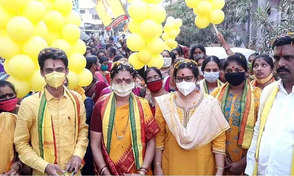 TDP leader P Aditi Gajapathi Raju along with others participating in the party campaign for municipal elections in Vizianagaram