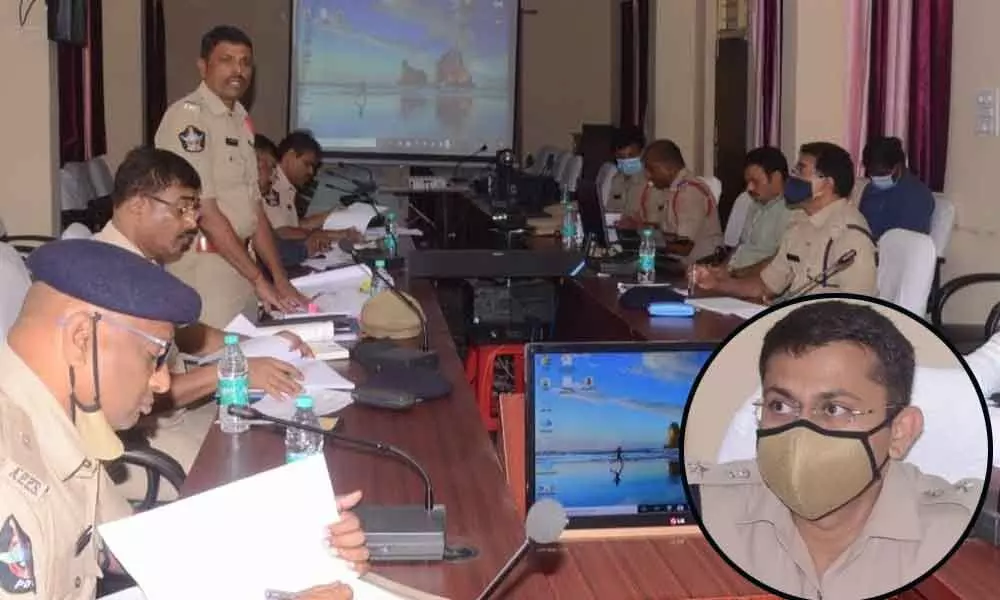 SP Amith Bardhar holding a review meeting with police officials in Srikakulam on Saturday