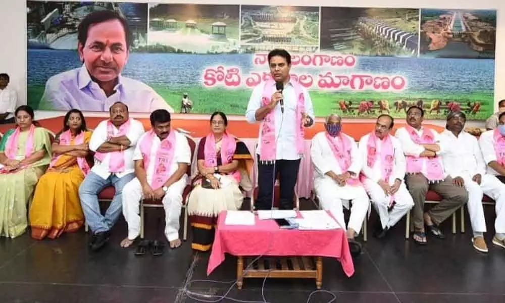 TRS working president KT Rama Rao addressing a meeting of city MLAs, MLCs, corporators and ex-corporators at Telangana Bhavan on Saturday