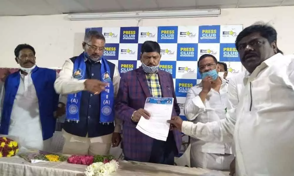 Republican Party of India (RIP) Rayalaseema in-charge Ananta Rathnam Madiga submitting a letter to Minister of State for Social Justice and Empowerment Ramdas Athawala urging him to continue Best Available School scheme in AP,  in Hyderabad on Saturday
