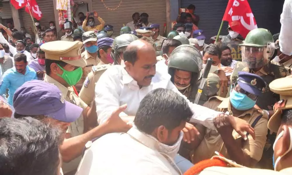 The police arresting the protestors in Khammam town on Saturday