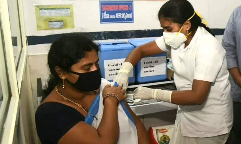 File photo of a health worker receiving the jab in Visakhapatnam