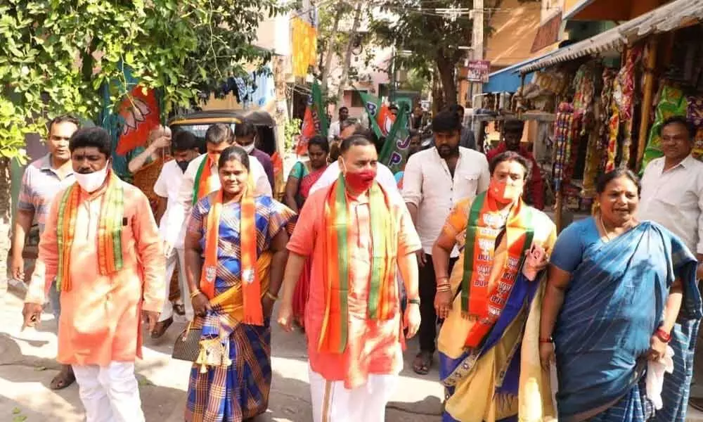 BJP national secretary and party co-in-charge for AP Sunil Deodhar campaigning in support of party candidate Kondeti Ratna in 29th division at Nehru Nagar in Tirupati on Sunday