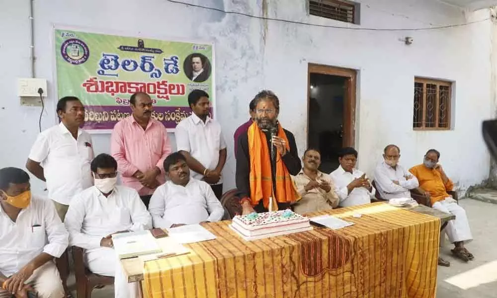 Ramagundam MLA Chander Patel speaking at a programme organised by the people of Meru caste here at Addaguntapalli of Ramagundam in Peddapalli district on Sunday