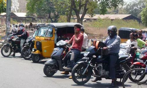 Cops sternly enforce rear view mirror rule