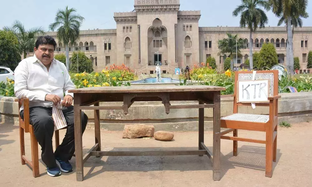 N Ramachandra Rao waits for Minister K T Rama Rao for open debate on announcement of employment and education issues, at Arts College in Osmania University on Monday. 	Photo: Ch Prabhu Das