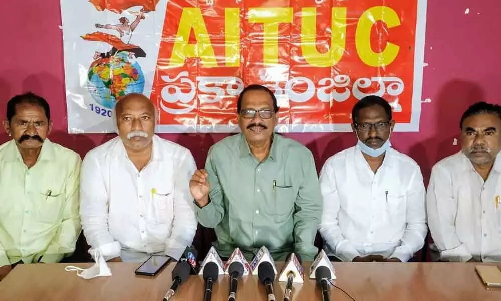 AITUC State president R Raveendranath addressing a press meet in Ongole on Monday