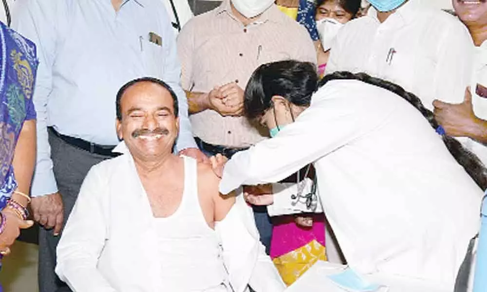Health Minister Eatala Rajender taking first dose of Covid-19 vaccine after launching second phase of vaccination drive at Huzurabad Area Hospital  on Monday