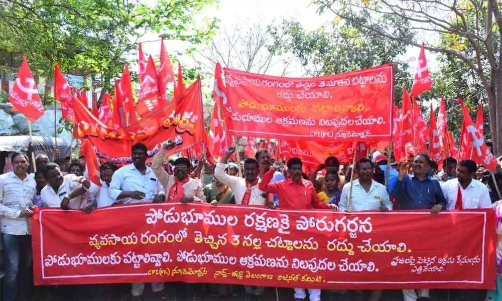 New Democracy leaders taking out a protest rally in Bhadrachalam on Monday