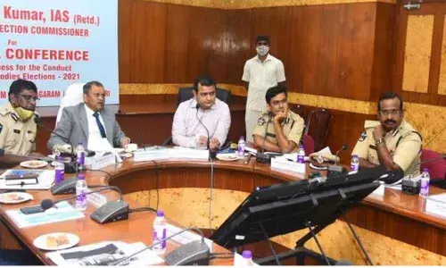 State Election Commissioner N Ramesh Kumar speaking at a review meeting in Visakhapatnam on Monday