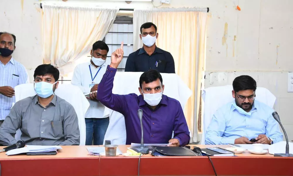 District Collector Dr A Sharath reviewing drinking water supply with the officials at the Collectorate in Kamareddy on Tuesday