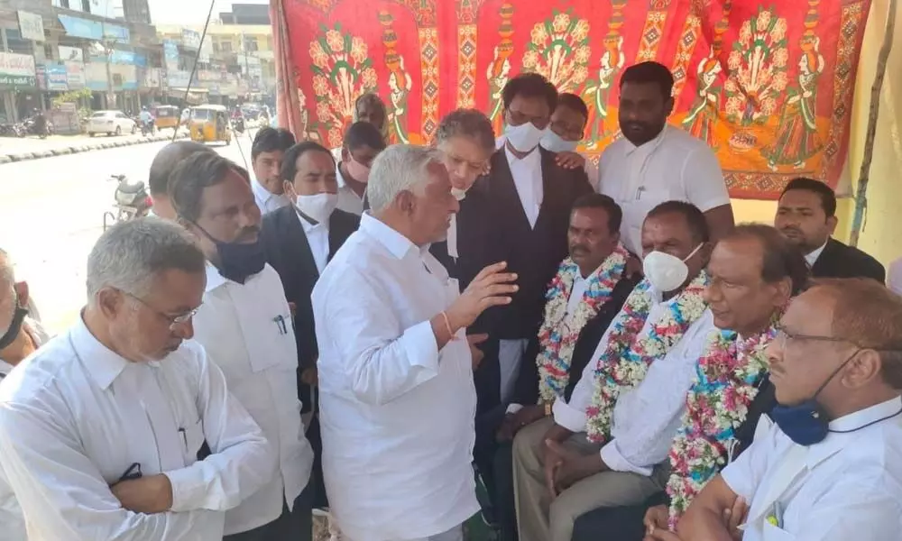 MLC Jeevan Reddy extending his support to Bar Association members, who are on indefinite hunger strike, in Jagtial on Tuesday